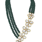 Floral Glow Ethnic Necklace Set. Black beaded necklace with gold and white Kundan floral motifs.