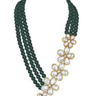Floral Glow Ethnic Necklace Set. Black beaded necklace with gold and white Kundan floral motifs.