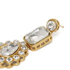 Graceful Layers with Kundan Set. Gold-plated red beaded necklace set with large white stones and matching drop earrings.