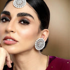 Pearl Perfection Maangtikka Set. Silver-plated round Kundan earrings and maang tikka with pearl detailing.