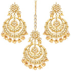 Radiance Kundan Pearl Maangtikka Set. Gold-plated chandbali-style earrings & Maangtikka with pearls and kundan.