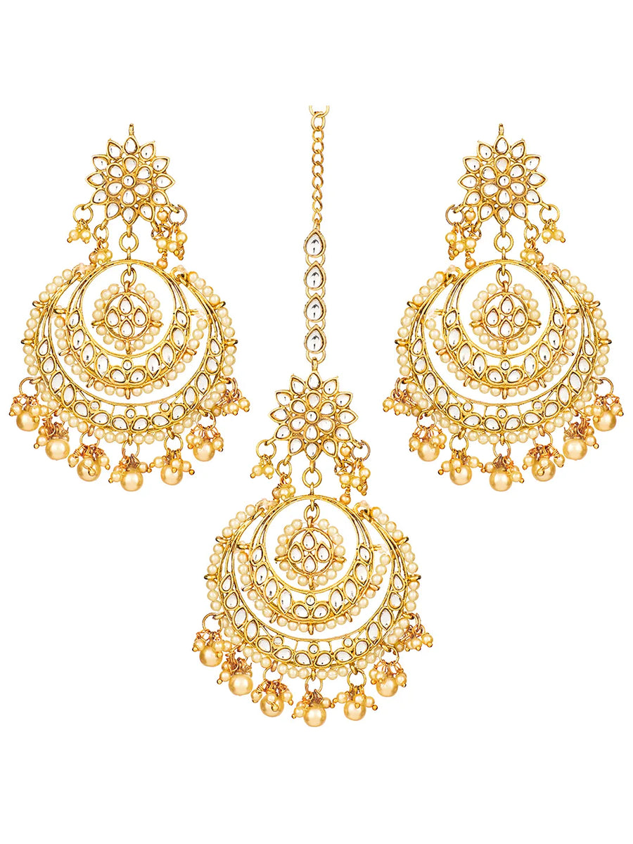 Radiance Kundan Pearl Maangtikka Set. Gold-plated chandbali-style earrings & Maangtikka with pearls and kundan.