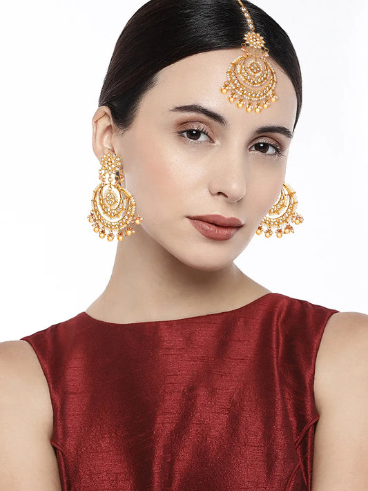 Radiance Kundan Pearl Maangtikka Set. Gold-plated chandbali-style earrings & Maangtikka with pearls and kundan.