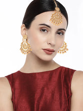 Radiance Kundan Pearl Maangtikka Set. Gold-plated chandbali-style earrings & Maangtikka with pearls and kundan.