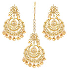Radiance Kundan Pearl Maangtikka Set. Gold-plated chandbali-style earrings & Maangtikka with pearls and kundan.