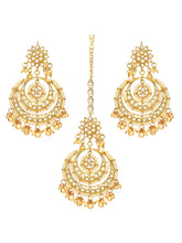Radiance Kundan Pearl Maangtikka Set. Gold-plated chandbali-style earrings & Maangtikka with pearls and kundan.