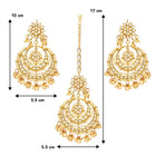Radiance Kundan Pearl Maangtikka Set. Gold-plated chandbali-style earrings & Maangtikka with pearls and kundan.