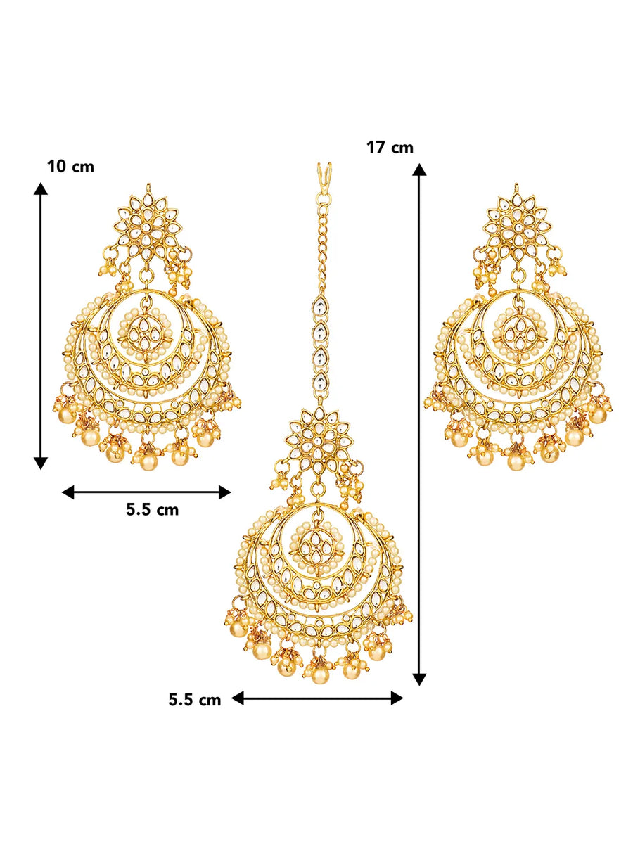Radiance Kundan Pearl Maangtikka Set. Gold-plated chandbali-style earrings & Maangtikka with pearls and kundan.