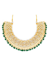 Divine Grace Kundan Bridal Set. Gold and green Kundan necklace set with pearls, matching earrings, and maang tikka.