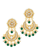Divine Grace Kundan Bridal Set. Gold and green Kundan necklace set with pearls, matching earrings, and maang tikka.