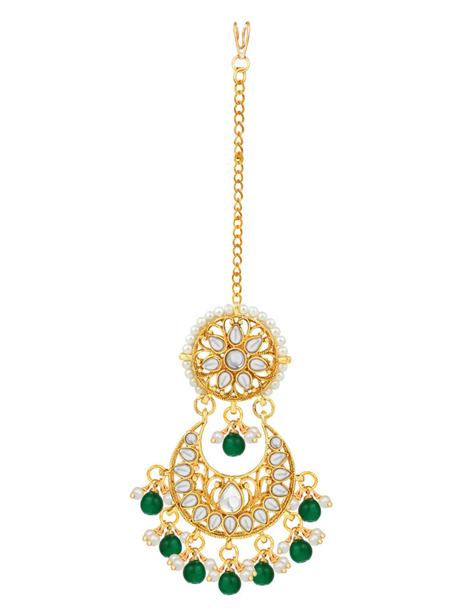 Divine Grace Kundan Bridal Set. Gold and green Kundan necklace set with pearls, matching earrings, and maang tikka.