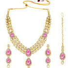 Majesty Kundan Long Necklace Set. Gold-plated Kundan necklace set with pink stones and kundan, paired with matching earrings and maang tikka.