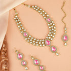 Majesty Kundan Long Necklace Set. Gold-plated Kundan necklace set with pink stones and kundan, paired with matching earrings and maang tikka.