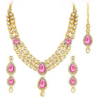 Majesty Kundan Long Necklace Set. Gold-plated Kundan necklace set with pink stones and kundan, paired with matching earrings and maang tikka.