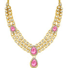 Majesty Kundan Long Necklace Set. Gold-plated Kundan necklace set with pink stones and kundan, paired with matching earrings and maang tikka.