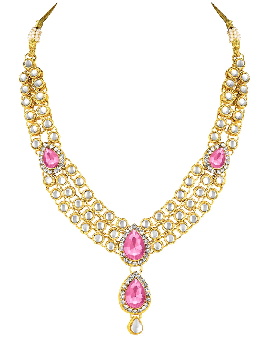 Majesty Kundan Long Necklace Set. Gold-plated Kundan necklace set with pink stones and kundan, paired with matching earrings and maang tikka.