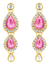 Majesty Kundan Long Necklace Set. Gold-plated Kundan necklace set with pink stones and kundan, paired with matching earrings and maang tikka.