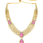 Majesty Kundan Long Necklace Set. Gold-plated Kundan necklace set with pink stones and kundan, paired with matching earrings and maang tikka.