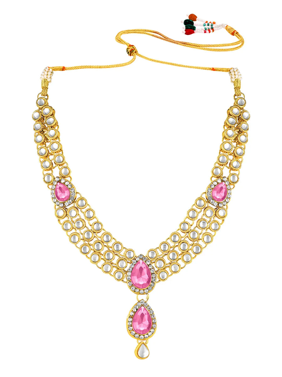 Majesty Kundan Long Necklace Set. Gold-plated Kundan necklace set with pink stones and kundan, paired with matching earrings and maang tikka.