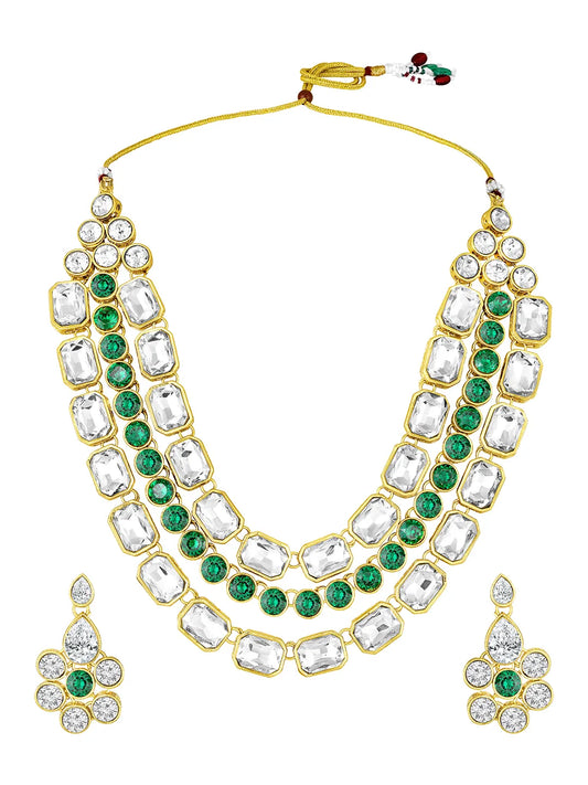 Crystal Studded Layered Necklace Set. Gold-plated Kundan necklace set with green and white stones, paired with matching earrings.