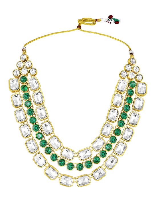 Crystal Studded Layered Necklace Set. Gold-plated Kundan necklace set with green and white stones, paired with matching earrings.