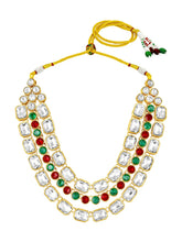 Crystal Studded Layered Necklace Set. Gold-plated Kundan necklace set with green, red and white stones, paired with matching earrings.