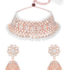 Radiance Faux Kundan Choker Set. Rose gold choker necklace set with white pearls and kundan, paired with matching floral jhumka earrings.