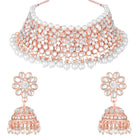 Radiance Faux Kundan Choker Set. Rose gold choker necklace set with white pearls and kundan, paired with matching floral jhumka earrings.