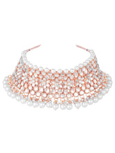 Radiance Faux Kundan Choker Set. Rose gold choker necklace set with white pearls and kundan, paired with matching floral jhumka earrings.