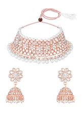 Radiance Faux Kundan Choker Set. Rose gold choker necklace set with white pearls and kundan, paired with matching floral jhumka earrings.