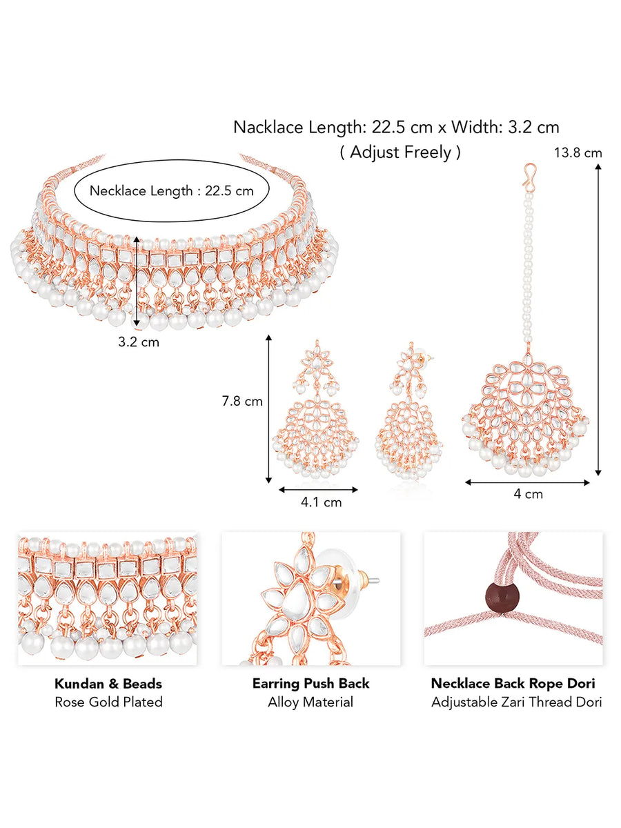 Marvel Kundan Pearls Choker Set. Rose gold choker necklace set with pearls and kundan, paired with matching earrings and maang tikka.