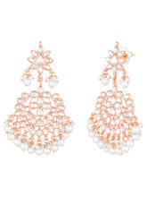 Marvel Kundan Pearls Choker Set. Rose gold choker necklace set with pearls and kundan, paired with matching earrings and maang tikka.