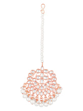 Marvel Kundan Pearls Choker Set. Rose gold choker necklace set with pearls and kundan, paired with matching earrings and maang tikka.