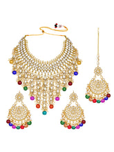 Bridal Bliss Kundan Pearl Necklace Set. Gold-plated Kundan bridal necklace set with colorful beads, matching jhumka earrings, and maang tikka. Perfect for weddings and festive occasions.