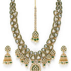 Bridal Bliss Kundan Pearl Adorn. Gold and green Kundan bridal necklace set with pearls, matching earrings, and maang tikka. Perfect for weddings and festive wear.