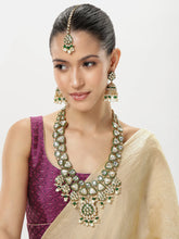 Bridal Bliss Kundan Pearl Adorn. Gold and green Kundan bridal necklace set with pearls, matching earrings, and maang tikka. Perfect for weddings and festive wear.