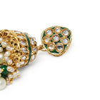 Bridal Bliss Kundan Pearl Adorn. Gold and green Kundan bridal necklace set with pearls, matching earrings, and maang tikka. Perfect for weddings and festive wear.