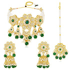 Floral Cascade Faux Kundan Set. Gold and green choker necklace set with Kundan, green beads, and white pearls, paired with matching earrings and maang tikka perfect for festive and ethnic wear.