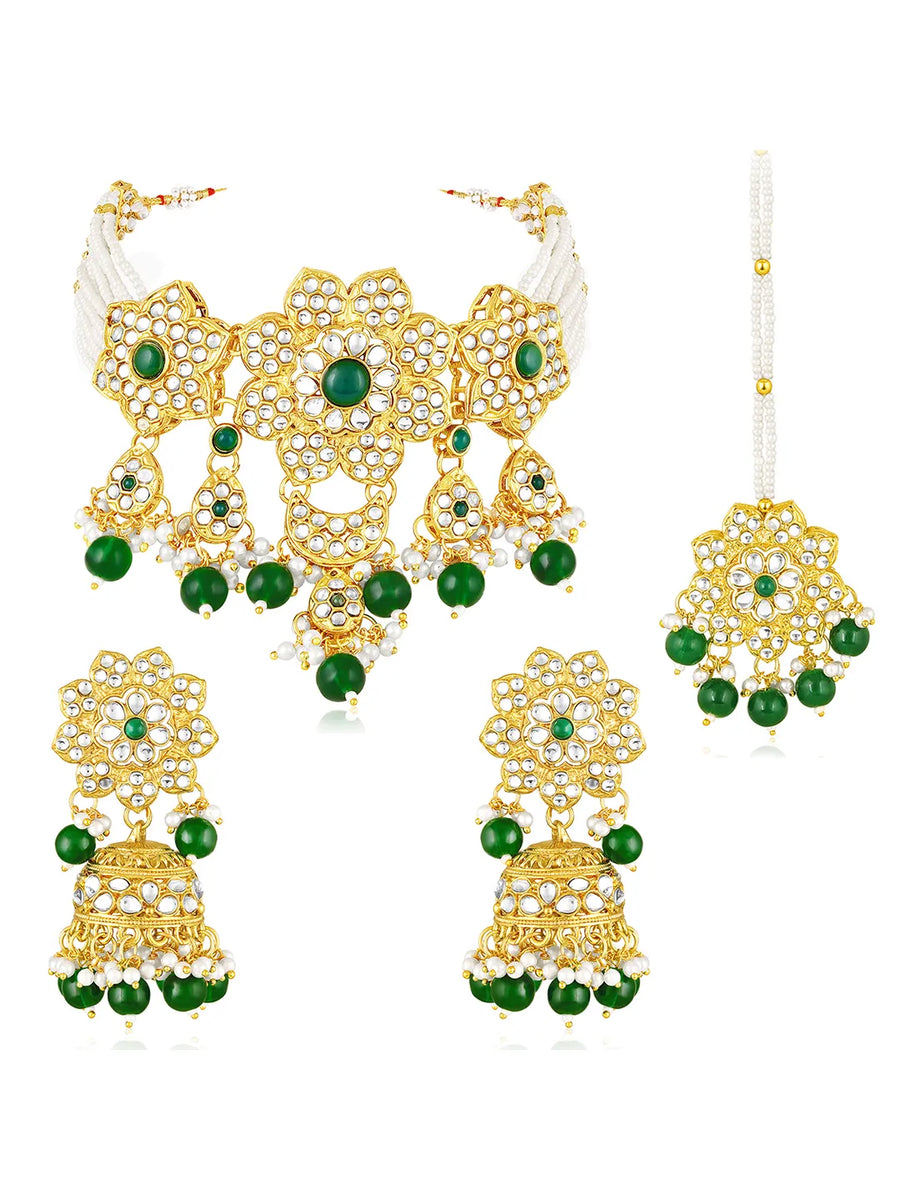 Floral Cascade Faux Kundan Set. Gold and green choker necklace set with Kundan, green beads, and white pearls, paired with matching earrings and maang tikka perfect for festive and ethnic wear.
