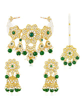 Floral Cascade Faux Kundan Set. Gold and green choker necklace set with Kundan, green beads, and white pearls, paired with matching earrings and maang tikka perfect for festive and ethnic wear.