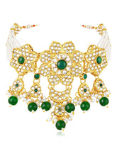 Floral Cascade Faux Kundan Set. Gold and green choker necklace set with Kundan, green beads, and white pearls, paired with matching earrings and maang tikka perfect for festive and ethnic wear.