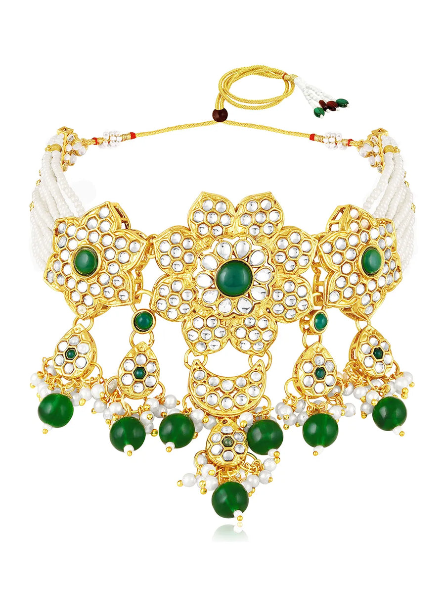 Floral Cascade Faux Kundan Set. Gold and green choker necklace set with Kundan, green beads, and white pearls, paired with matching earrings and maang tikka perfect for festive and ethnic wear.