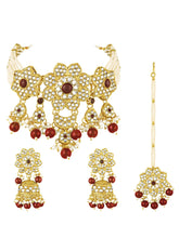 Floral Cascade Faux Kundan Set. Gold and maroon choker necklace set with Kundan, maroon beads, and white pearls, paired with matching earrings and maang tikka perfect for festive and ethnic wear.