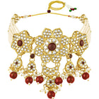 Floral Cascade Faux Kundan Set. Gold and maroon choker necklace set with Kundan, maroon beads, and white pearls, paired with matching earrings and maang tikka perfect for festive and ethnic wear.