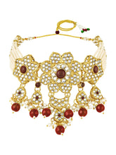 Floral Cascade Faux Kundan Set. Gold and maroon choker necklace set with Kundan, maroon beads, and white pearls, paired with matching earrings and maang tikka perfect for festive and ethnic wear.