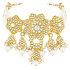 Floral Cascade Faux Kundan Set. Gold and white choker necklace set with Kundan, white beads, and white pearls, paired with matching earrings and maang tikka perfect for festive and ethnic wear.