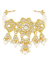 Floral Cascade Faux Kundan Set. Gold and white choker necklace set with Kundan, white beads, and white pearls, paired with matching earrings and maang tikka perfect for festive and ethnic wear.