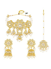 Floral Cascade Faux Kundan Set. Gold and white choker necklace set with Kundan, white beads, and white pearls, paired with matching earrings and maang tikka perfect for festive and ethnic wear.