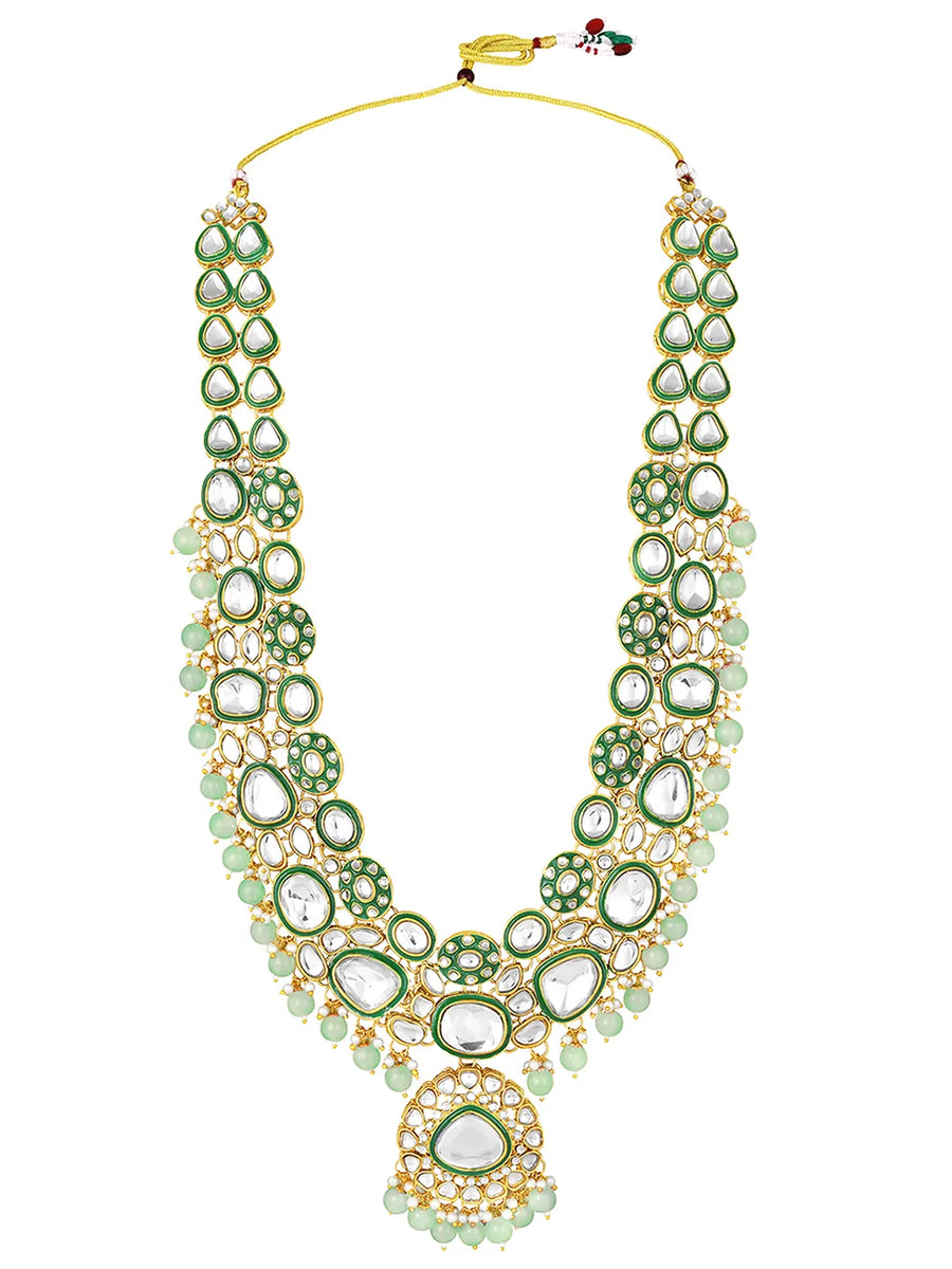 Glistening Nature Necklace Set by Peora. Gold-plated green Kundan necklace set with matching earrings and maang tikka, featuring mint green beads.