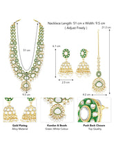 Glistening Nature Necklace Set by Peora. Gold-plated white Kundan necklace set with matching earrings and maang tikka, featuring white beads.